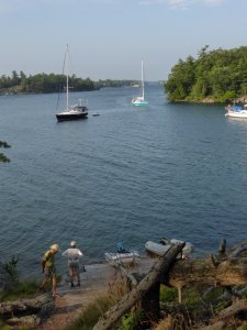 Uitzicht Camelot op dingy en Bodyguard